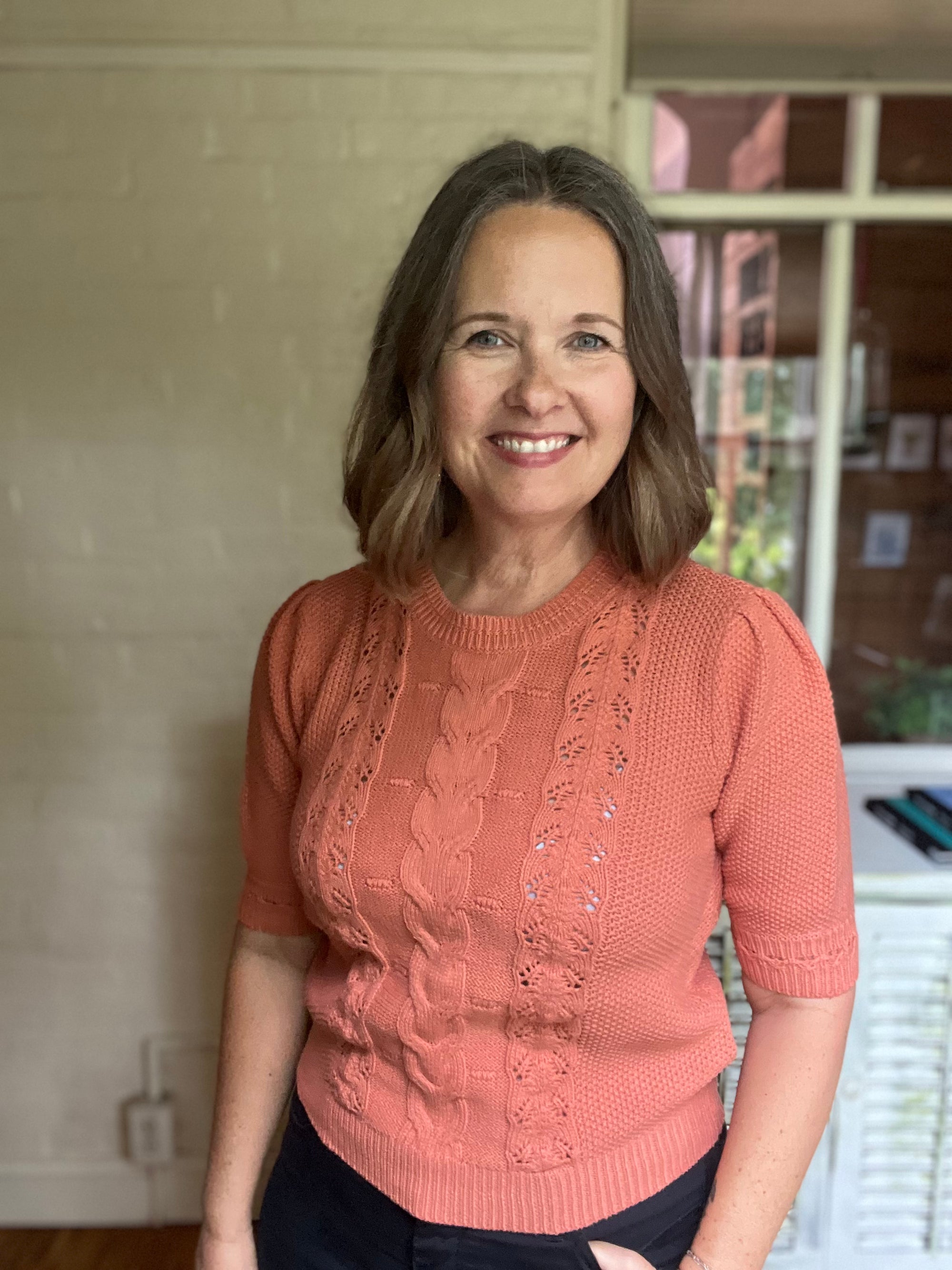 orange short sleeve sweater top