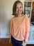 orange dolman long sleeve top
